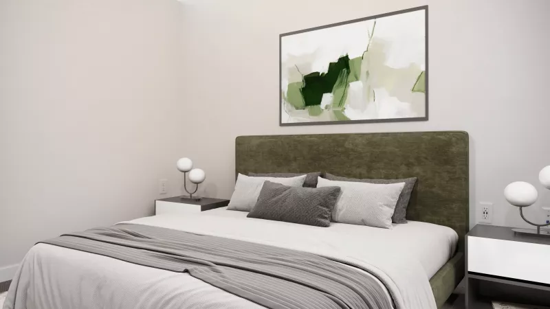 Modern bedroom with a dark green headboard, white bedding, grey throw, two nightstands, and abstract art above the bed.